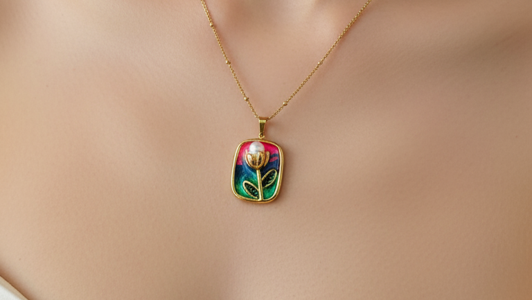 Necklace with a colorful pendant worn by a model against a neutral background