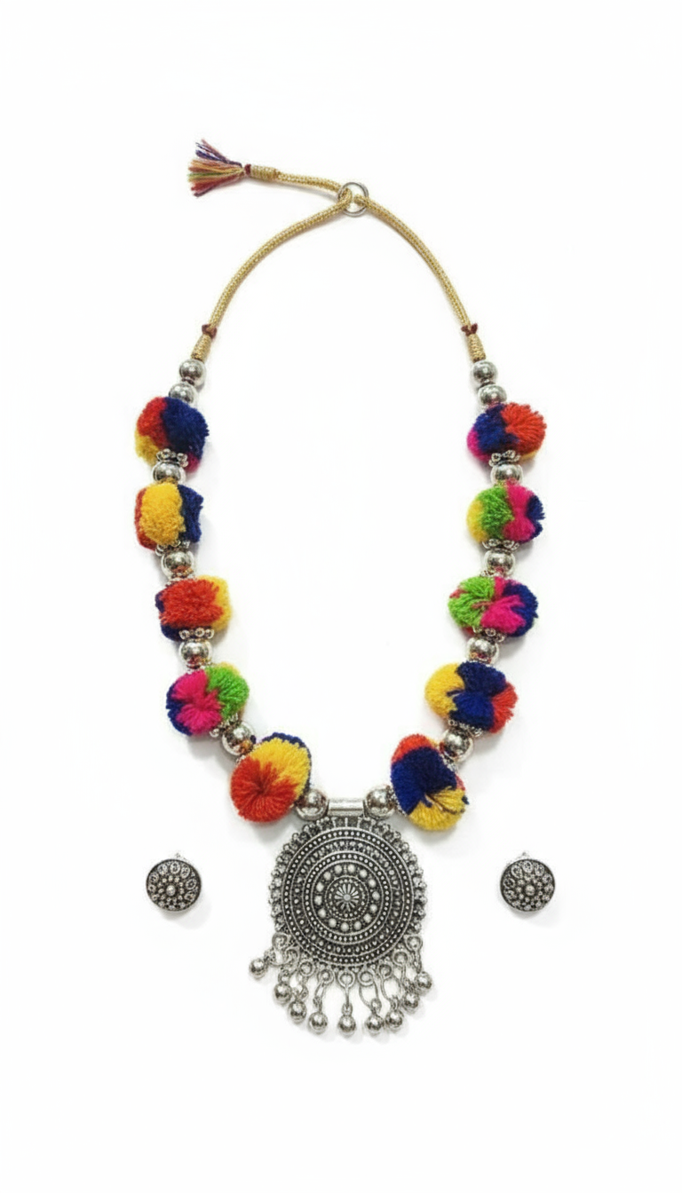 Artistic Flatlay of Pompom Necklace