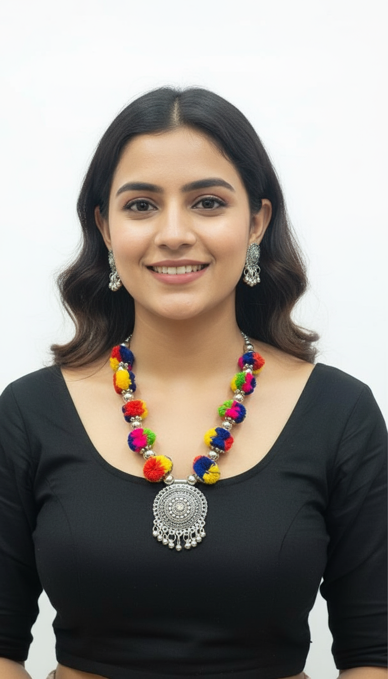 Artistic Flatlay of Pompom Necklace